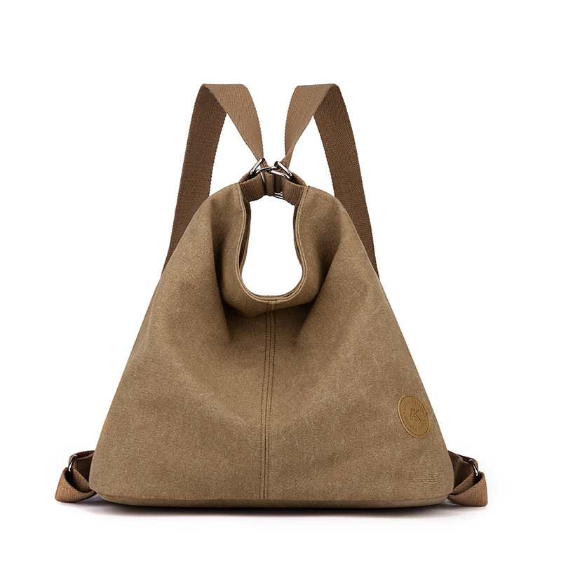 Coffee Versatile 3-in-1 Canvas Backpack and Shoulder Bag Large Capacity Handbag for Women Ideal for Travel School and Everyday Use - Image 1