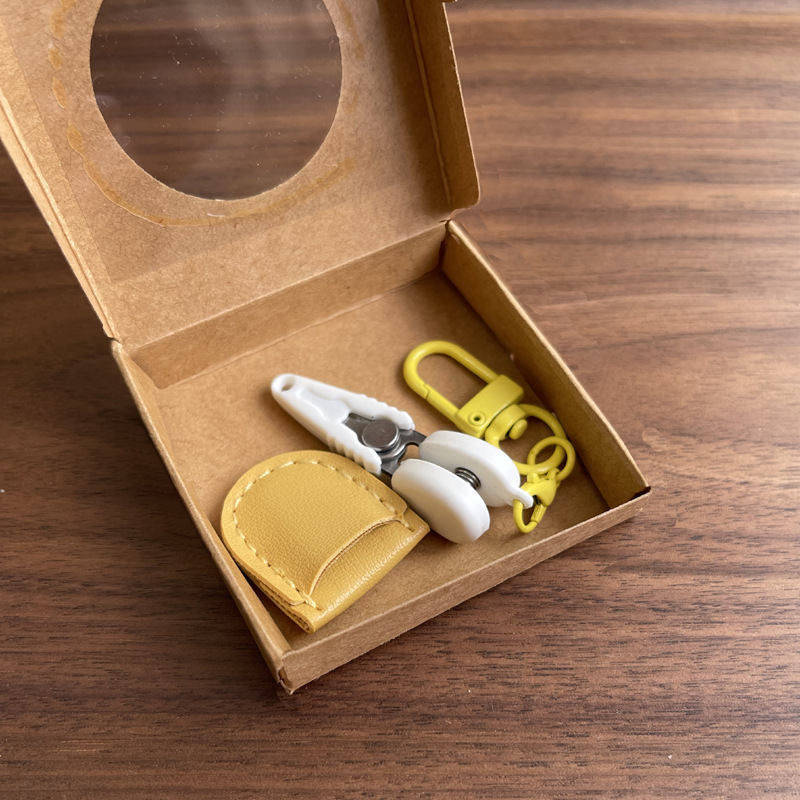 Yellow Ultra-Portable Mini Precision Scissors Set - Compact 7cm Craft Snips with Safety Cap, Leather Sheath, and Keychain Hook for Travel and DIY - Image 1