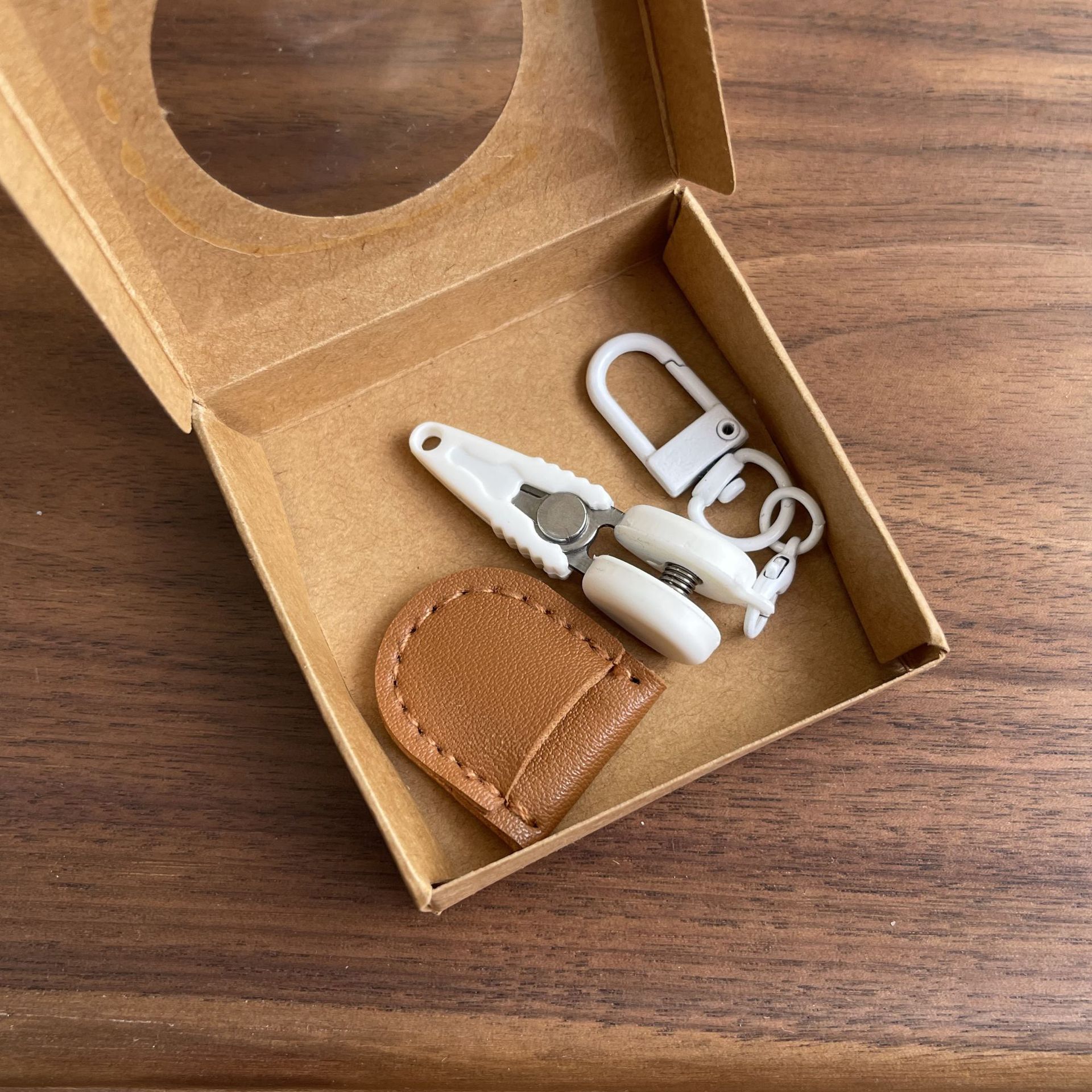 Brown Ultra-Portable Mini Precision Scissors Set - Compact 7cm Craft Snips with Safety Cap, Leather Sheath, and Keychain Hook for Travel and DIY - Image 1