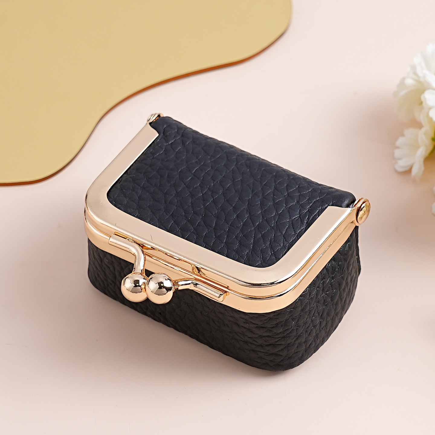 Black Genuine Leather Mini Kiss-Lock Jewelry Pouch - Portable Travel Organizer for Rings, Earrings, Necklaces, and Coins - Image 1