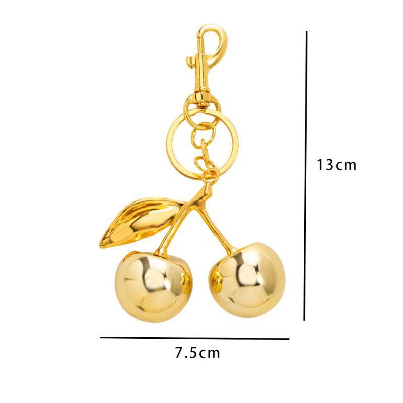 Golden Fashionable Cherry Keychain with Fruit Pendant for Handbags and Keys Stylish Accessory Solution for Local Trendsetters - Image 1
