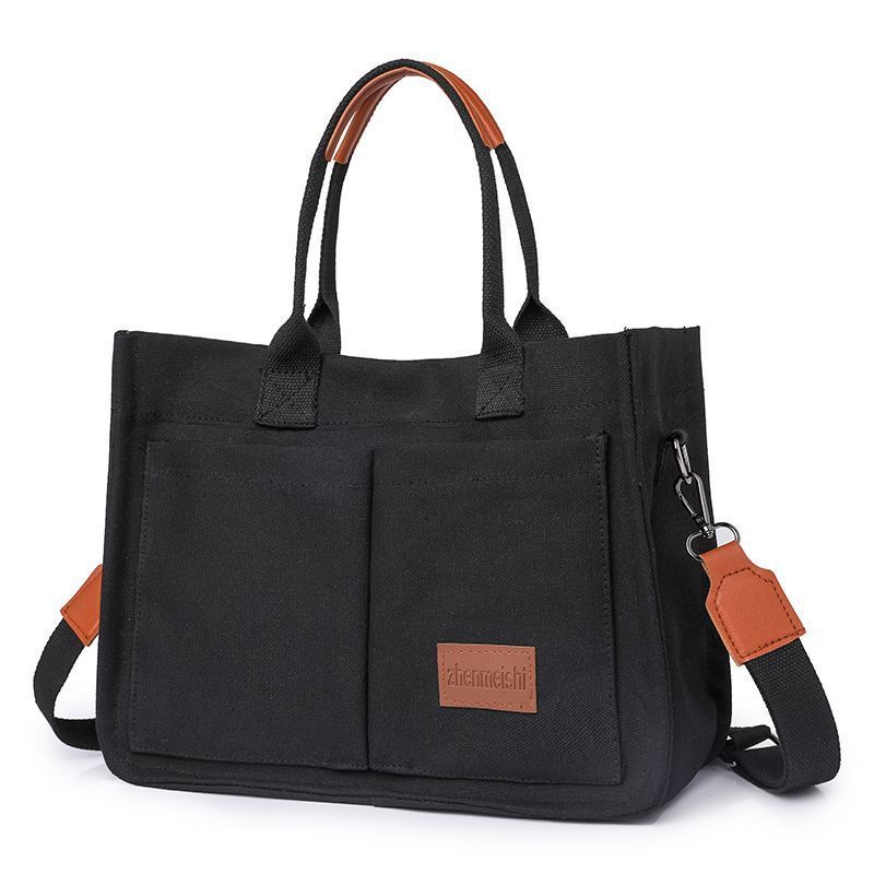 Black Large Canvas Tote Bag for Women - Multi-Pocket Utility Organiser with Wide Adjustable Shoulder Strap - Trendy Crossbody and Handheld Bag for Work, Shopping and Travel - Daily Comfort Solution - Image 1