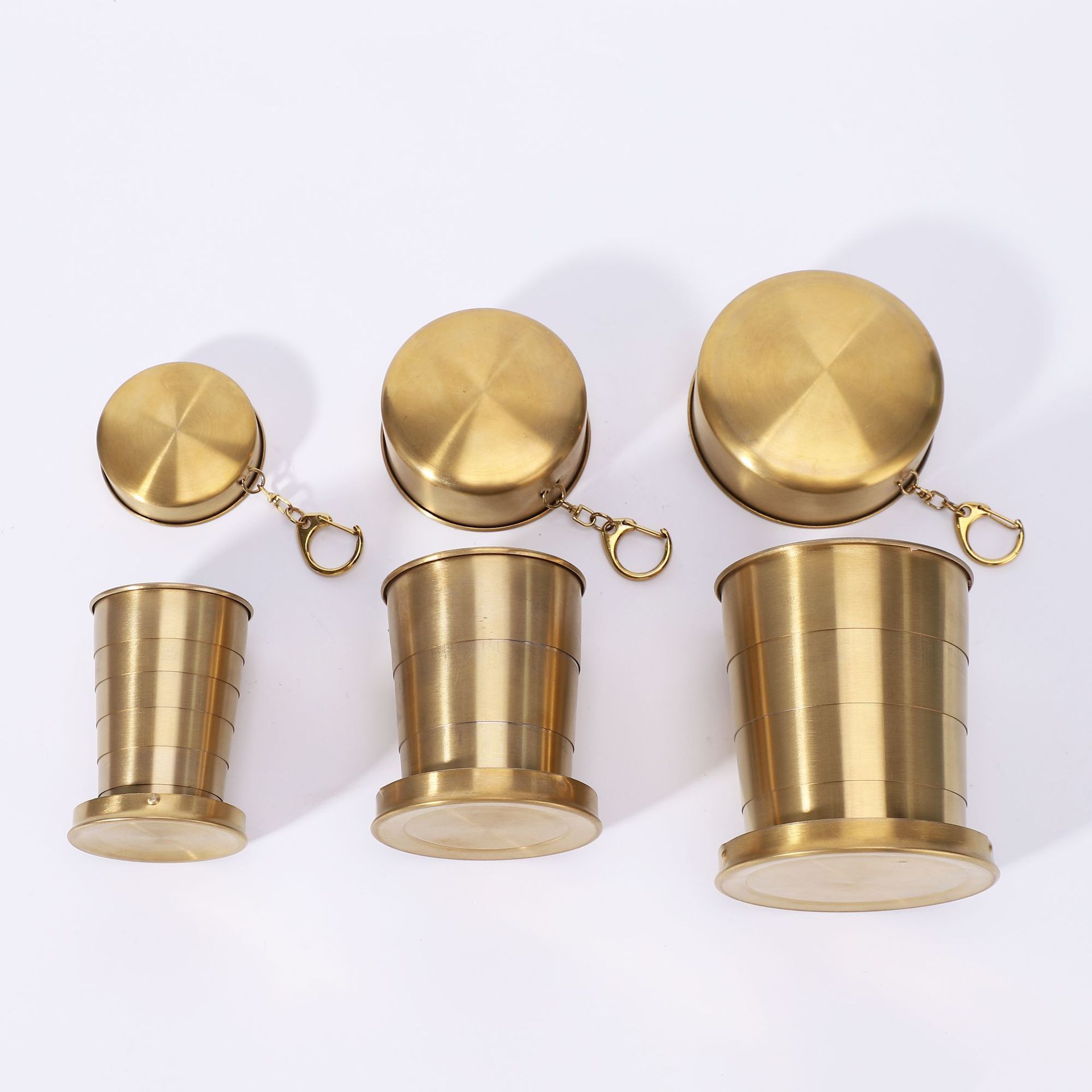 3-Capacity Gold Stainless Steel Collapsible Travel Cup Set(75ml + 150ml + 250ml) - Compact Telescopic Drinking Cup with Keychain & Dust-Proof Lid for Outdoor Hiking and Camping - Image 1