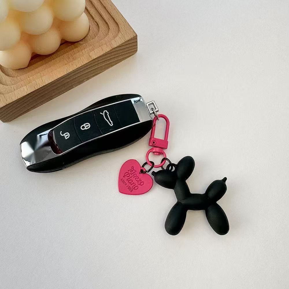 2-Piece Black Balloon Dog Keychain Set with Heart Charm Bag Pendant Cute Couple Gift - Image 1