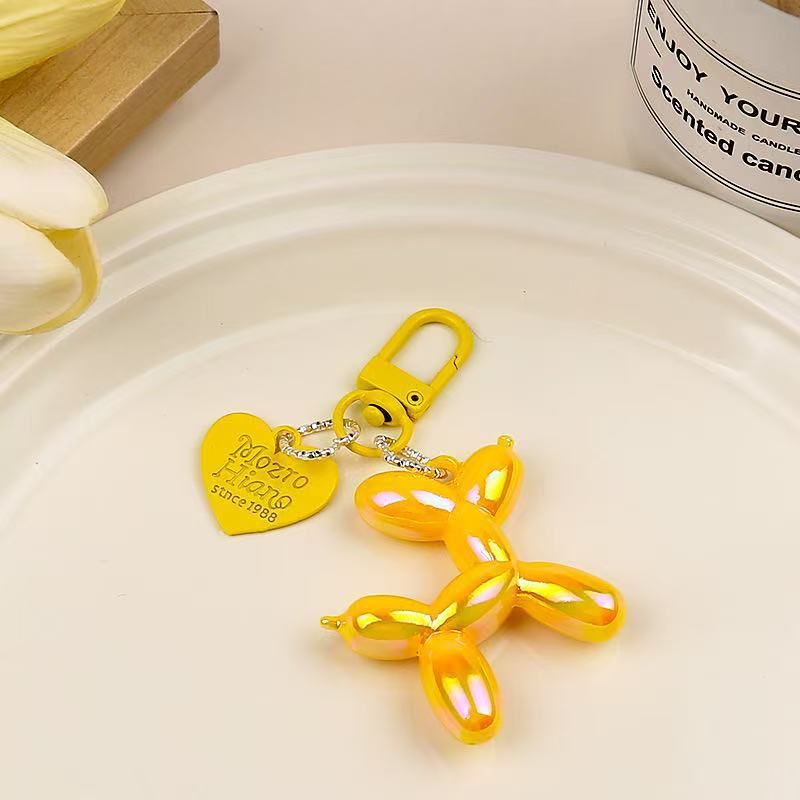 2-Piece Yellow Balloon Dog Keychain Set with Heart Charm Bag Pendant Cute Couple Gift - Image 1