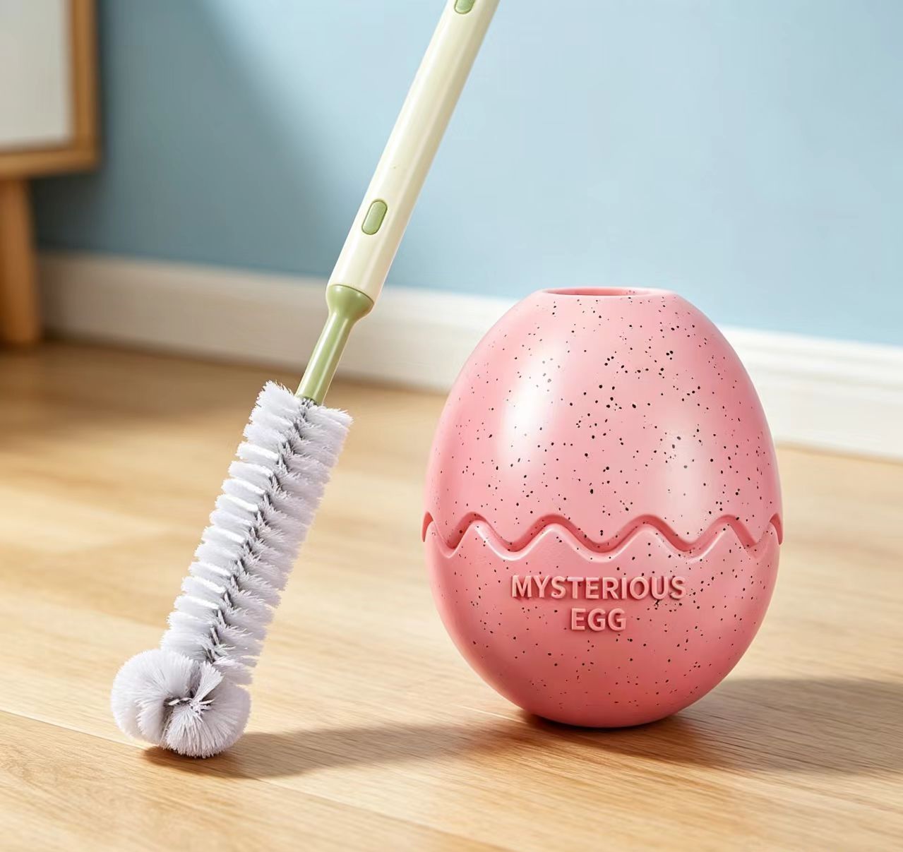 2-piece Pink Dinosaur Egg Dog Slow Feeder Toy Set with Cleaning Brush - TPR Interactive Treat Dispenser for Mental Stimulation, Anxiety Relief and Healthy Digestion - Includes Extendable Brush for Easy Cleaning - Image 1